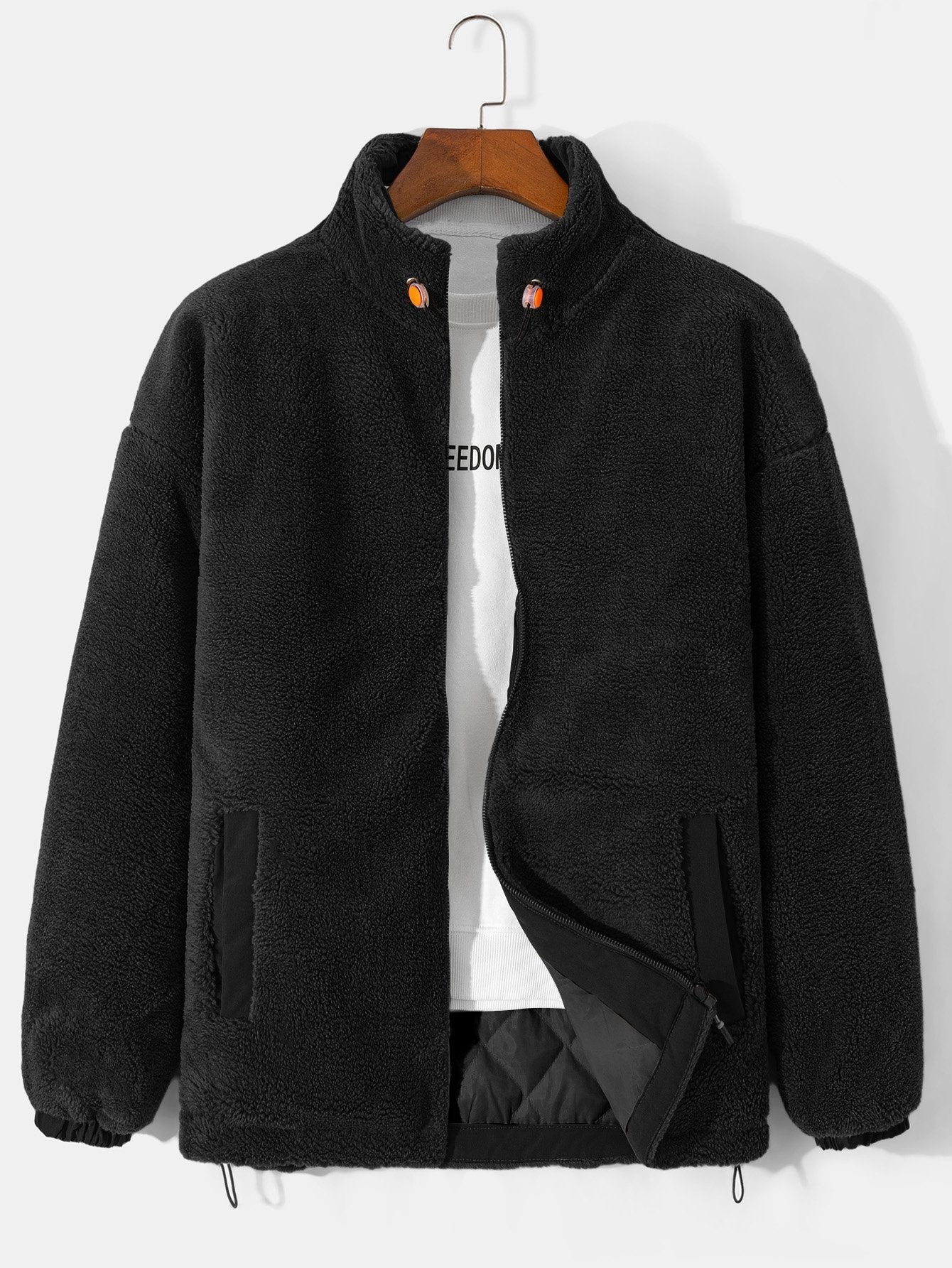 Manteau zippé en polaire matelassée doublée