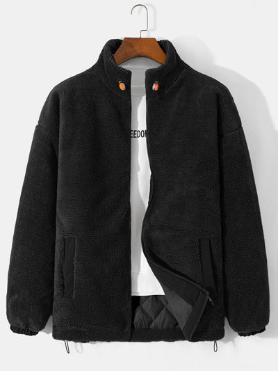 Manteau zippé en polaire matelassée doublée