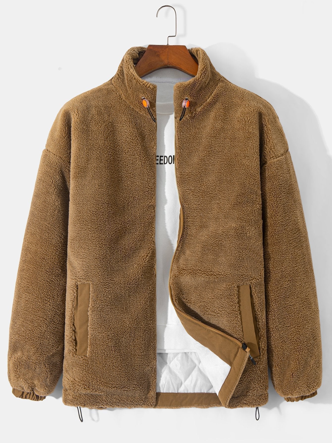 Manteau zippé en polaire matelassée doublée