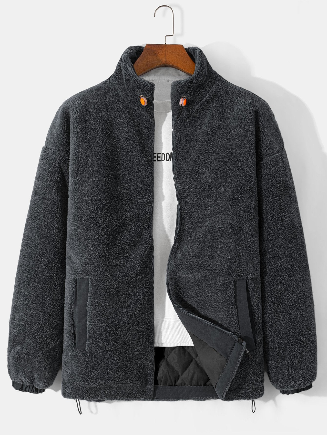 Manteau zippé en polaire matelassée doublée