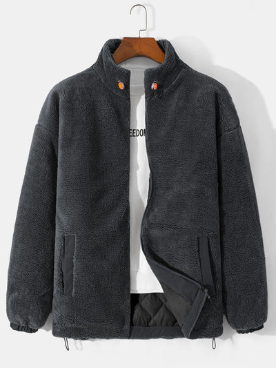 Manteau zippé en polaire matelassée doublée