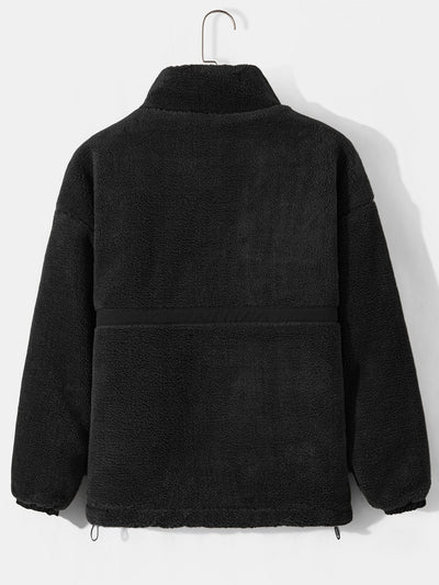 Manteau zippé en polaire matelassée doublée