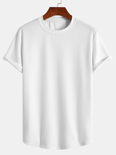 T-shirt côtelé à ourlet arrondi et coupe près du corps