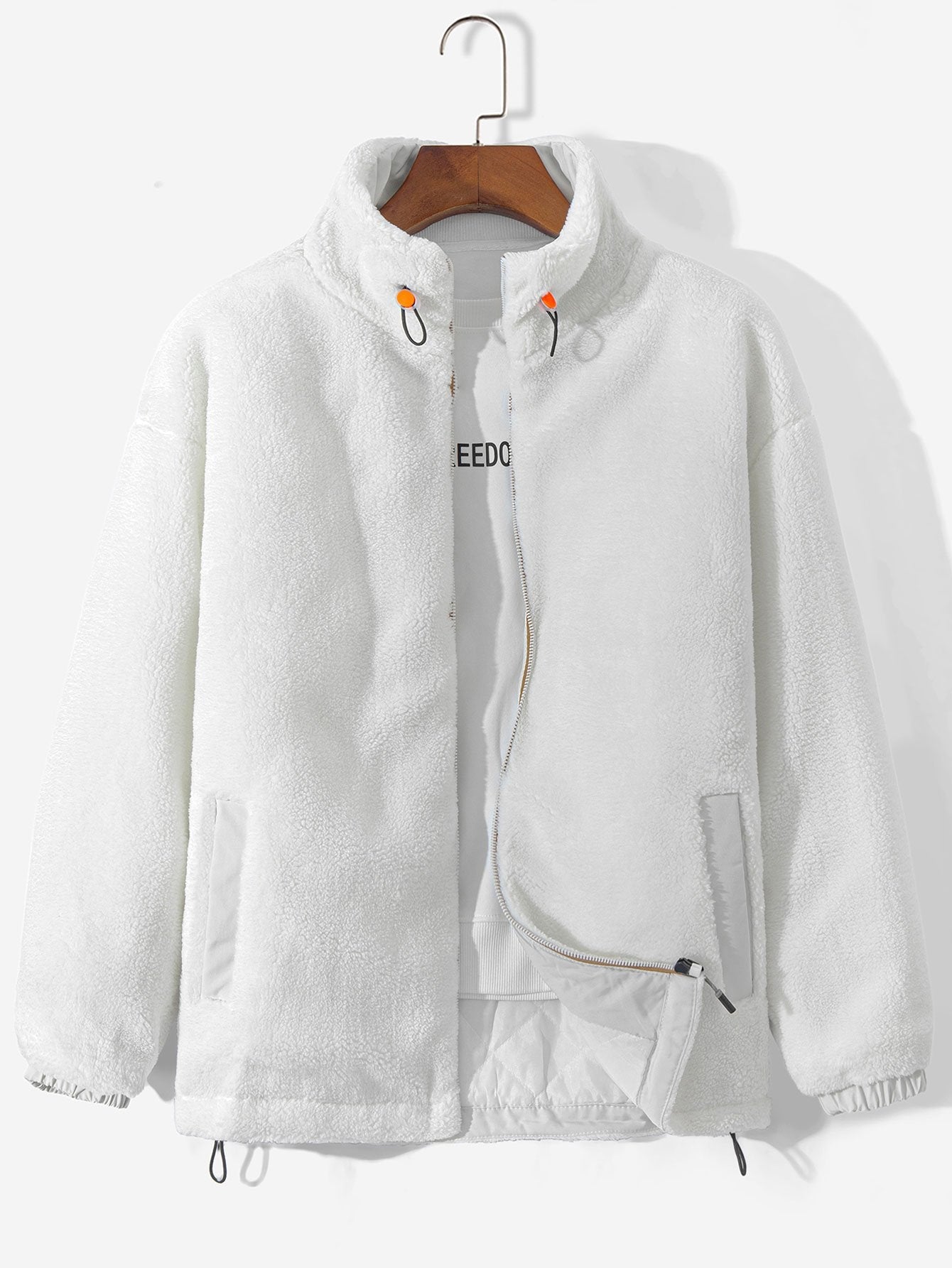 Manteau zippé en polaire matelassée doublée