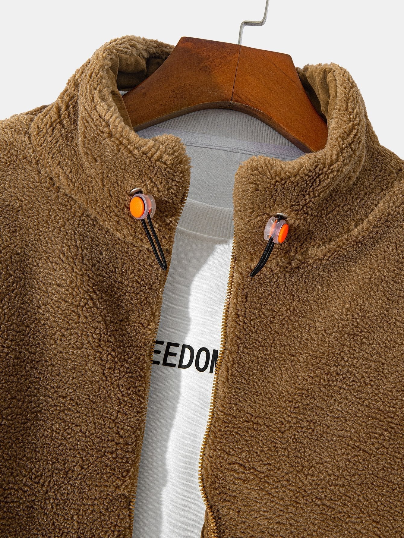 Manteau zippé en polaire matelassée doublée