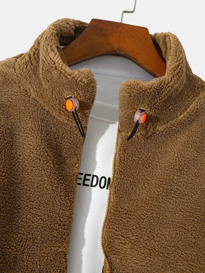Manteau zippé en polaire matelassée doublée
