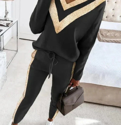 Élégant jogging noir avec accents dorés pour femmes - Claire