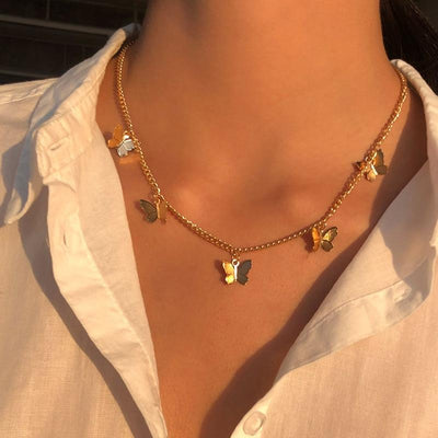 Collier en forme de papillon plaqué argent et or